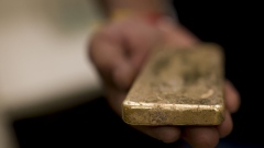 A worker holds a gold bar converted from the personal jewelry at a verification center operated by MMTC-PAMP India Pvt. Ltd. in New Delhi, India, on Friday, Sept. 2, 2022. Indians will celebrate Dussehra, Diwali and Dhanteras in October, when buying gold is considered favorable; following these festivals is Indian wedding season, a major driver of gold purchases. Photographer: Anindito Mukherjee/Bloomberg