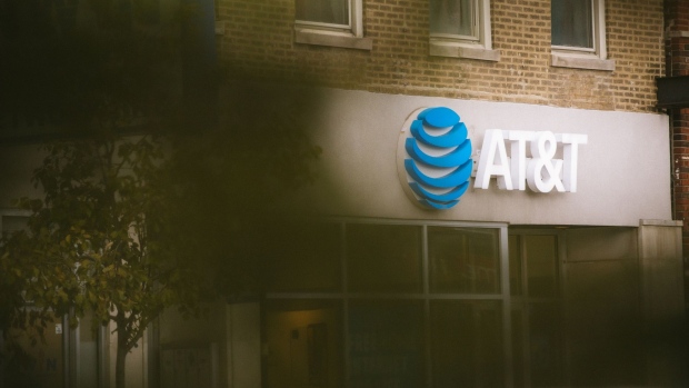 Signage is displayed outside an AT&T Inc. store in Chicago, Illinois, U.S., on Tuesday, Oct. 22, 2019. AT&T is scheduled to release earnings figures on October 28.