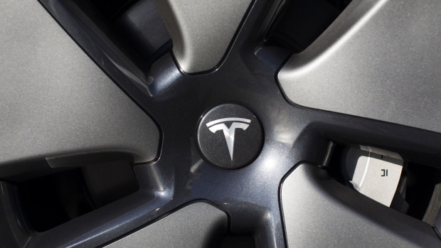 A logo on a wheel of an Tesla Inc. electric vehicle at the automaker's temporary test drive center in Sydney, Australia, on Monday, April 12, 2021. Tesla and the electric-car industry generally thrive in the world’s richest nations. Not so in Australia, where even tractors outsell EVs two to one.
