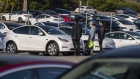 A Tesla dealership in Colma, California, U.S., on Wednesday, Jan. 26, 2022. U.S. auto sales will climb just 3.4% this year to 15.4 million cars and trucks as the semiconductor shortages continue to constrain vehicle inventory, auto dealers predict.