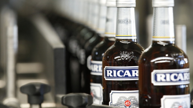 A line of Pernod Pastis bottles moves along a conveyor at the Pernod Ricard SA alcoholic beverage plant and warehouse in Vendeville, France, on Monday, Feb. 25, 2019. Pernod Ricard is considering a sale of its wine division, which includes Australia’s Jacob’s Creek and Spain’s Campo Viejo labels, according to people familiar with the matter. Photographer: Luke MacGregor/Bloomberg