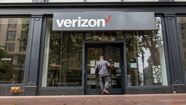 A customer enters a Verizon store in San Francisco, California, U.S., on Tuesday, July 20, 2021. Verizon Communications Inc. is scheduled to release earnings figures on July 21.