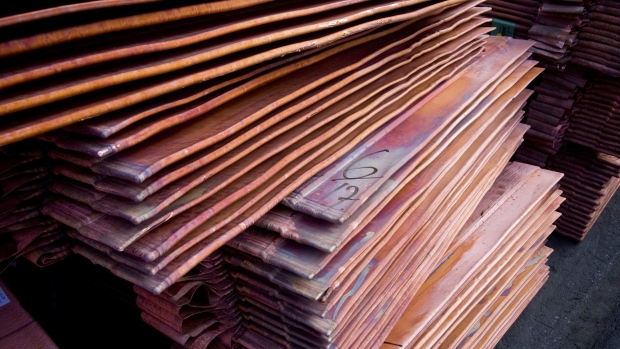 A stack of copper slabs sits in the warehouse. Photographer: John Guillemin/Bloomberg