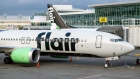 A Flair Airlines aircraft at Vancouver International Airport. Photographer: James MacDonald/Bloomberg