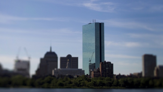 The John Hancock Tower, Bain Capital's headquarters, stands in Boston.