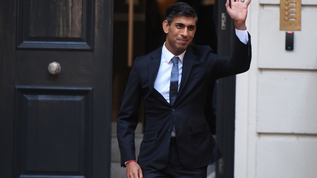 Rishi Sunak, incoming UK prime minister, leaves Conservative Campaign Headquarters in London, UK, on Monday, Oct. 24, 2022. Speaking less than an hour after emerging victorious in the race to succeed Liz Truss as premier, the former Chancellor of the Exchequer said his party faces an “existential threat,” and needs to come together, according to Simon Hoare, a Tory lawmaker present at Sunak’s address to MPs behind closed doors on Monday.