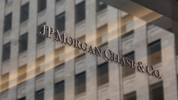 JPMorgan Chase & Co. signage outside the headquarters in New York, U.S., on Thursday, July 22, 2021. After a year of Zoom meetings and awkward virtual happy hours, New York's youngest aspiring financiers have returned to the offices of the city's investment banks, where they're making the most of the in-person mentoring and networking they've lacked during the pandemic.