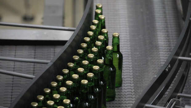 Bottles of Stella Artois brand beer move along the production line at the Anheuser-Busch Budweiser bottling facility in St. Louis, Missouri, U.S., on Thursday, July 8, 2021. Anheuser-Busch InBev is scheduled to release earnings figures July 29. Photographer: Luke Sharrett/Bloomberg