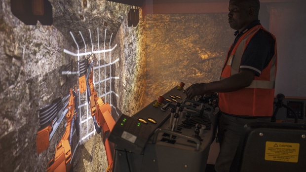 A worker trains on a virtual mining simulator at the Gold Fields Ltd. South Deep gold mine in Westonaria, South Africa, on Wednesday, Oct. 12, 2022. Gold Fields will seek shareholder approval next month for its acquisition of Canadas Yamana, which owns about 56% of the giant Mara project in Argentina.