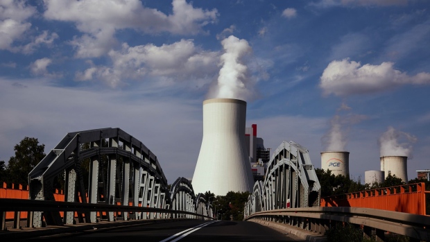 Vapor rises from the cooling towers of the Turow coal powered power plant, operated by PGE SA, in Bogatynia, Poland, on Sunday, Aug. 15, 2021. European companies chasing zero-emission targets are starting to turn to countries such as Poland to bolster their clean-power supplies.