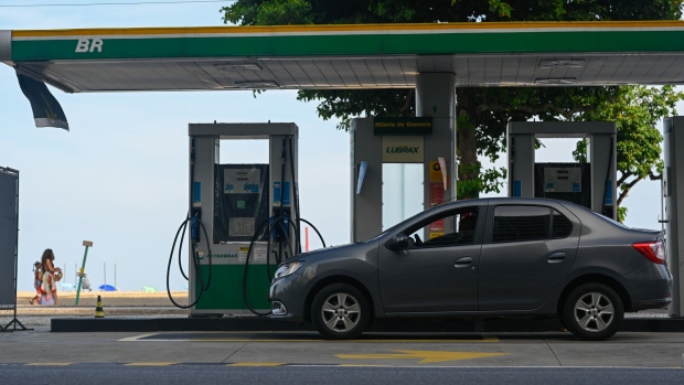 A vehicle refuels at a Petroleo Brasileiro SA (Petrobras) gas station in Rio de Janeiro, Brazil, on Friday, April 8, 2022. Brazil’s consumer prices surged past all forecasts in March following the national oil company’s decision to jack up fuel costs, adding to global inflationary pressures in the wake of Russia’s invasion of Ukraine.