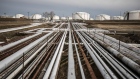 Oil transportation pipes and storage tanks stand in the Duna oil refinery, operated by MOL Hungarian Oil & Gas Plc, in Szazhalombatta, Hungary, on Monday, Feb. 13, 2019. Oil traded near a three-month high as output curbs by OPEC tightened global supply while trade talks between the U.S. and China lifted financial markets.