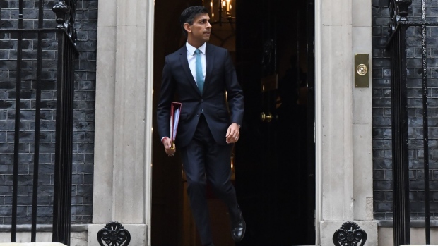 Rishi Sunak, UK prime minister, departs 10 Downing Street for his first Prime Minister's Questions (PMQ) in London, UK, on Wednesday, Oct. 26, 2022. Sunak delayed an economic strategy announcement planned for Monday until Nov. 17 as he sought more time to make the “right decisions” on managing the British economy.