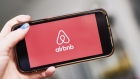 AirBnb Inc. signage is displayed on an smartphone in an arranged photograph taken in the Brooklyn borough of New York, U.S., on Friday, April 17, 2020. Home-sharing leader Airbnb Inc. lined up $1 billion in debt boosting a financial cushion it can use to grow and pay bills as the global coronavirus pandemic crushes demand for travel and diminishes the prospect of an initial public offering. Photographer: Bloomberg/Bloomberg
