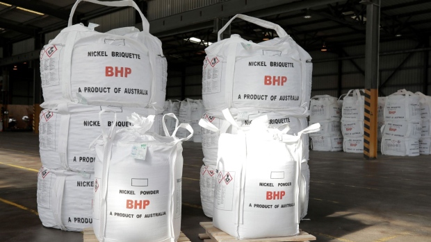 Bags filled with nickel briquette and nickel powder sit in a warehouse at the BHP Group Ltd. Kwinana Nickel Refinery in Kwinana, Western Australia, Australia, on Friday, Aug. 2, 2019. The world's biggest miners, including BHP Group and Glencore Plc, are finally firm believers in the electric vehicle battery revolution -- what they don't agree on is which metals will deliver the best long-term exposure to the developing global market.