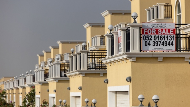 A 'For Sale' sign on a residential villa in the Jumeirah Park district of Dubai, United Arab Emirates, on Wednesday, Feb. 23, 2022. A government committee set up before the pandemic enlisted some of Dubai’s largest developers as members to try to manage supply and demand in the property market and ensure that state-owned businesses don’t crowd out private builders.