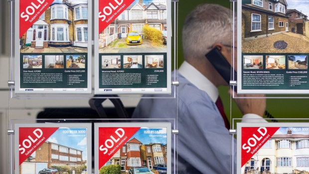 Properties for sale and sold in the window of an estate agents in London, UK, on Thursday, Oct. 13, 2022. UK estate agents turned pessimistic about the housing market, anticipating prices will decline over the next year for the first time since the start of the coronavirus pandemic.