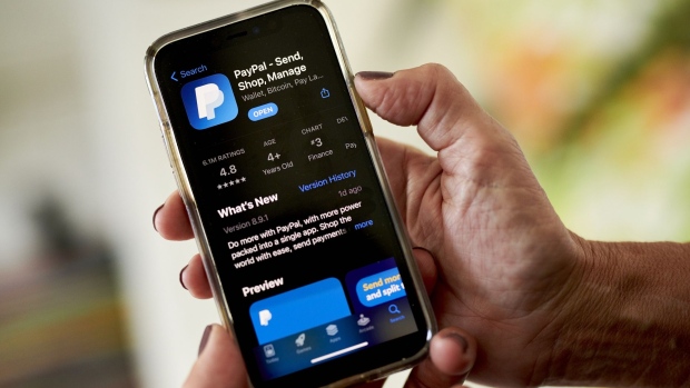 The PayPal application in the Apple App Store on a smartphone arranged in Saint Thomas, U.S. Virgin Islands, on Saturday, Jan. 29, 2022. PayPal Holdings Inc. is scheduled to release earnings figures on February 1.