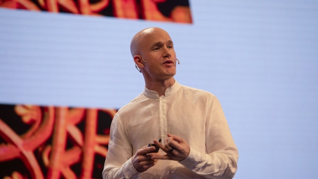 Brian Armstrong, chief executive officer of Coinbase Global Inc., speaks at the company's event in Bengaluru, India, on Thursday, April 7, 2022. Coinbase, the U.S. cryptocurrency exchange operator, plans to more than triple its number of employees in India this year to around 1,000, according to Armstrong.