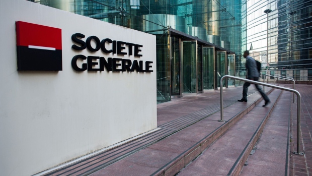A visitor arrives at the headquarters of Societe Generale SA in Paris, France, on Wednesday, Nov. 3, 2022. Societe Generale surpassed BNP Paribas SA to become the top underwriter of European asset-backed securities as the value of deals fell 40% year-to-date compared with the same period last year.
