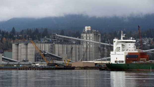The G3 Terminal Vancouver, a grain export terminal, in North Vancouver, British Columbia, Canada, on Saturday, Nov. 20, 2021. Mountains of wheat and canola are stranded in Canada after storms blocked access to the Port of Vancouver during peak shipping season.