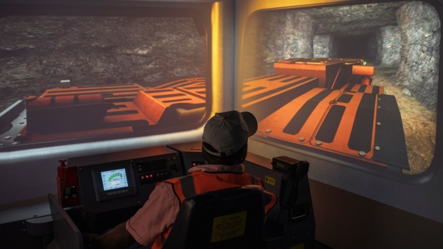 A worker trains on a virtual mining simulator at the Gold Fields Ltd. South Deep gold mine in Westonaria, South Africa, on Wednesday, Oct. 12, 2022. Gold Fields will seek shareholder approval next month for its acquisition of Canada’s Yamana, which owns about 56% of the giant Mara project in Argentina. Photographer: Michele Spatari/Bloomberg