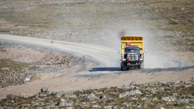 An Agnico Eagle Mines Ltd. hauling truck full of minerals drives outside Amaruq, Nunavut, Canada, on Tuesday, July 30, 2019. Mining is the largest private sector employer in Canada's Arctic, generating up to a quarter of gross domestic product across the three northern territories and accounting for one in six jobs. Photographer: Cole Burston/Bloomberg