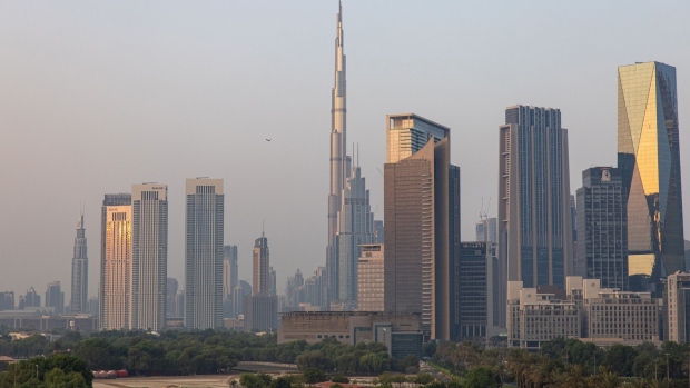 The Burj Khalifa skyscraper, center, amidst commercial and residential properties on the city skyline in downtown Dubai, United Arab Emirates, on Friday, Sept. 16, 2022. Office rents in Dubai are rebounding for the first time in six years, rising faster than in New York or London as global banks and businesses expand into the financial hub known for its love of glitzy construction. Photographer: Christopher Pike/Bloomberg