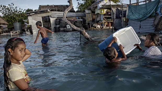 Large parts of the village Eita, Kiribati, have drowned in flooding from the sea, in 2015.  Photographer: Jonas Gratzer/LightRocket/Getty Images