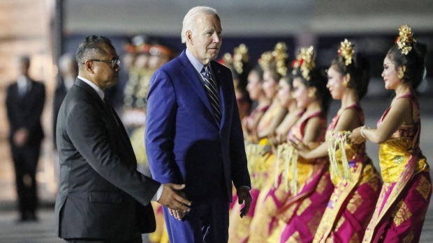US President Joe Biden (C) disembarks from Air Force One upon arrival at Ngurah Rai International Airport in Denpasar on the Indonesian resort island of Bali, November 13, 2022, as he travels to attend the G20 Summit.  Photographer: Made Nagi/AFP/Getty Images