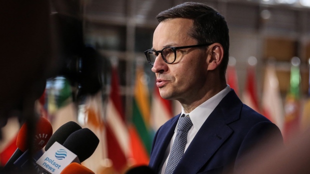 Mateusz Morawiecki, Poland's prime minister, speaks to the media on the second day of a special European Union (EU) leaders summit at the European Council headquarters in Brussels, Belgium, on Tuesday, May 31, 2022. EU leaders overcame weeks of division to clinch a deal on partially banning Russian oil, but calls to target one of Putin's other big moneymakers, gas, are opening new rifts in the bloc.