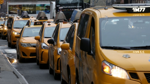 Taxis wait to pick up commuters outside Pennsylvania Station in New York, U.S., on Wednesday, Feb. 5, 2020. New York City has for decades talked about improving the neighborhood around antiquated Pennsylvania Station with the kind of development that's invigorated other parts of Manhattan. Real estate billionaire Steven Roth is finally seizing the moment.
