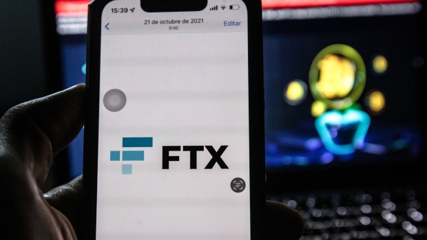 The FTX logo on a smartphone arranged in Barcelona, Spain, on Tuesday, Nov. 15, 2022. FTX Group named a slate of new independent directors to oversee the collapsed crypto empire and said its bankruptcy may involve more than a million creditors. Photographer: Angel Garcia/Bloomberg