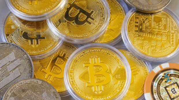 Illustrative bitcoin tokens at a Bitcoin Change bureau in Tel Aviv, Israel on Wednesday, Feb. 2, 2022. Bitcoin slipped back after touching a near two-week high, spotlighting the token’s struggle to vault a key technical hurdle and reclaim the $40,000 level.