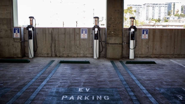 ChargePoint Inc. electric vehicle (EV) charging stations stand in a municipal parking lot in Los Angeles, California, U.S., on Tuesday, July 11, 2017. City Council committee signed off financing for a program to provide more than $1.1 million in funding to add dozens of EV charging stations around the city in addition to the 560 already in place at city facilities and street locations.