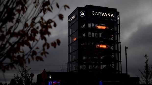A Carvana Vending Machine location in Novi, Michigan, U.S., in Novi, Michigan, U.S., on Sunday, Oct. 31, 2021. Hertz Global Holdings Inc., fresh off a blockbuster order for 100,000 Teslas, reached an exclusive agreement to supply Uber drivers with electric vehicles and signed up Carvana Co. to dispose of rental cars it no longer wants. Photographer: Emily Elconin/Bloomberg