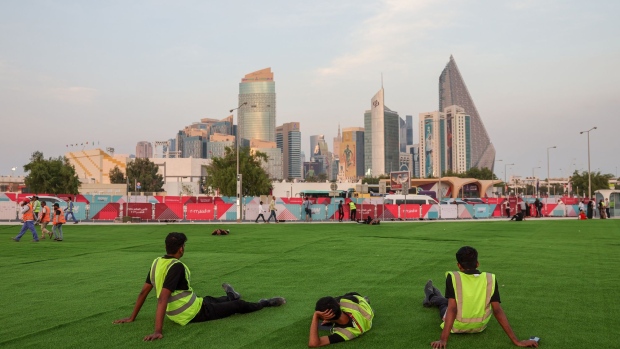 DOHA, QATAR - NOVEMBER 18: The men from the Budweiser stand pose for a photo at the Fan Festival ahead of the FIFA World Cup Qatar 2022 at Fan Festival Al Bidda Park on November 18, 2022 in Doha, Qatar. (Photo by Claudio Villa/Getty Images) Photographer: Claudio Villa/Getty Images Europe