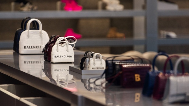 Leather handbags in the window display of a Balenciaga SA luxury goods store, operated by Kering SA, in Paris, France, on Wednesday, Oct. 21, 2020. Kering reports third quarter earnings on Oct. 22. Photographer: Benjamin Girette/Bloomberg