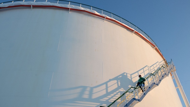 An oil storage tank at the custody transfer facility in Salym, Russia. Photographer: Andrey Rudakov/Bloomberg