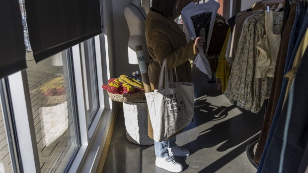 A shopper inside a women's clothing store in the East Village neighborhood of Des Moines, Iowa. Photographer: Kathryn Gamble/Bloomberg