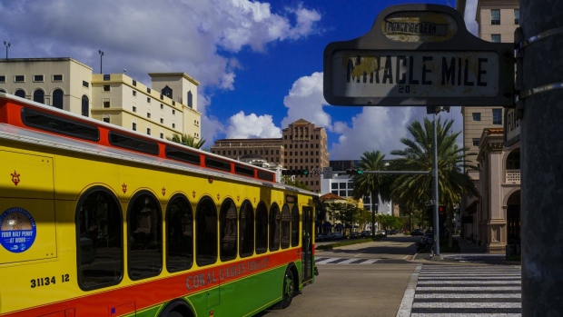 A trolley travels through the Miracle Mile Coral Gables shopping district in downtown Coral Gables, Florida, US, on Thursday, Sept. 1, 2022. The Citadel founder worth $29.6 billion has ditched Chicago for Wall Street South.