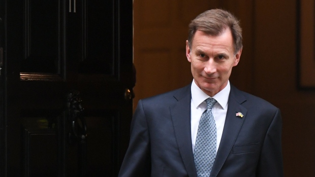 Jeremy Hunt, UK chancellor of the exchequer, departs 11 Downing Street to present the Autumn Statement at Parliament, in London, UK, on Thursday, Nov. 17, 2022. Hunt faces a clear yet far from straightforward task Thursday: reassure markets he can stabilize UK public finances, but without inflicting devastating damage on public services.