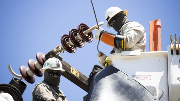 VENTURA, CA - MAY 13: A Southern California Edison crew installs a new overhead switch for circuit reliability on May 13, 2020 in Ventura, California. During the coronavirus (COVID-19) pandemic Edison is focused only on essential work to maintain the grid. According to Skylar Graybill, interim district manager for Ventura, with so many more people at home, they are focused on public safety and circuit reliability. Graybill says, "With our crews, we practice a daily wellness screening and we keep our crews in the same pods...that helps to minimize contact...This is the principal the fire departments are using and it's the same for us... We also have some sequestered crews of vital workers. They are living in RVs in a central zone and are more isolated from contact." (Photo by Brent Stirton/Getty Images)