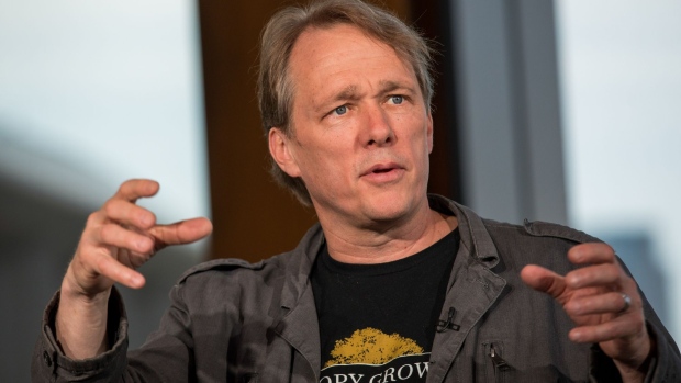 Bruce Linton, chief executive officer of Canopy Growth Corp., gestures while speaking during a Bloomberg Television interview in London, U.K., on Tuesday, May 14, 2019. Acreage Holdings Inc.'s early holders will be free to sell as many shares as they want this week for the first time since the cannabis company went public, giving them the chance to weigh in on its controversial takeover deal with Canopy Growth.