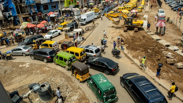 Heavy traffic approaches a roundabout in Ikeja district of Lagos, Nigeria, on Friday, April 22, 2022. Choked supply chains, partly due to Russia’s invasion of Ukraine, and an almost 100% increase in gasoline prices this year, are placing upward price pressures on Africa’s largest economy. Photographer: Damilola Onafuwa/Bloomberg