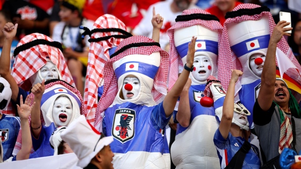Japan fans at the team's World Cup match against Germany on Nov. 23. Photographer: Alex Grimm/Getty Images