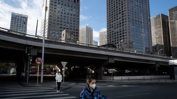 A near-deserted road in Beijing, China, on Saturday, Nov. 26, 2022. China's daily Covid infections broke through 30,000 for the first time ever as officials struggle to contain outbreaks that have triggered a growing number of restrictions across the country's most important cities.