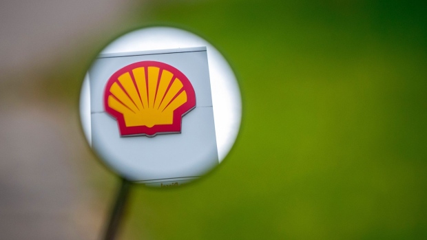 A Shell logo outside a Royal Dutch Shell Plc gas station in Berlin, Germany, on Wednesday, Aug. 25, 2021. Hydrogen remains a marginal part of Shell's energy mix, but the company expects to expand the business as part of its strategy to achieve net-zero emissions by 2050. Photographer: Krisztian Bocsi/Bloomberg