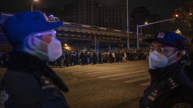 Police during a protest against China's strict zero Covid measures in Beijing on Nov. 28.