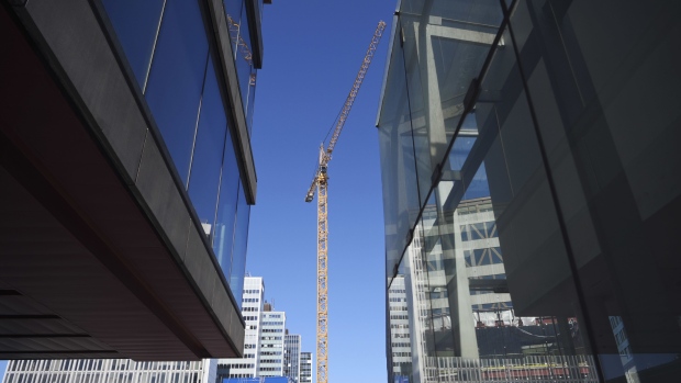 A construction crane stands above a commercial site in Stockholm, Sweden, on Thursday, April 23, 2020. Confidence levels in Sweden plunged to record lows in April amid concerns that the coronavirus pandemic may push the Nordic region’s biggest economy into its worst recession since World War II. Photographer: Mikael Sjoberg/Bloomberg